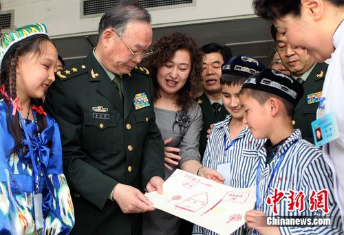 武警总医院免费收治17名新疆先心病患儿--中国国情