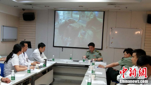 重庆医院收治罕见双头女婴 暂不分离保全性命(图)--中国国情网