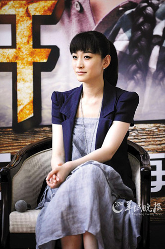 李小冉自认很二:从小像男生 不介意被叫男人婆--中国国情网